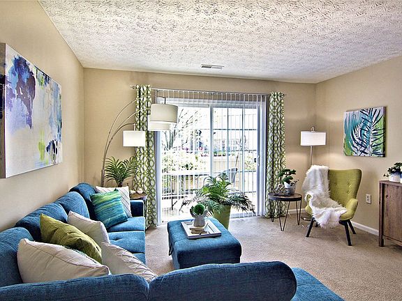 Cozy living room with natural light and seating