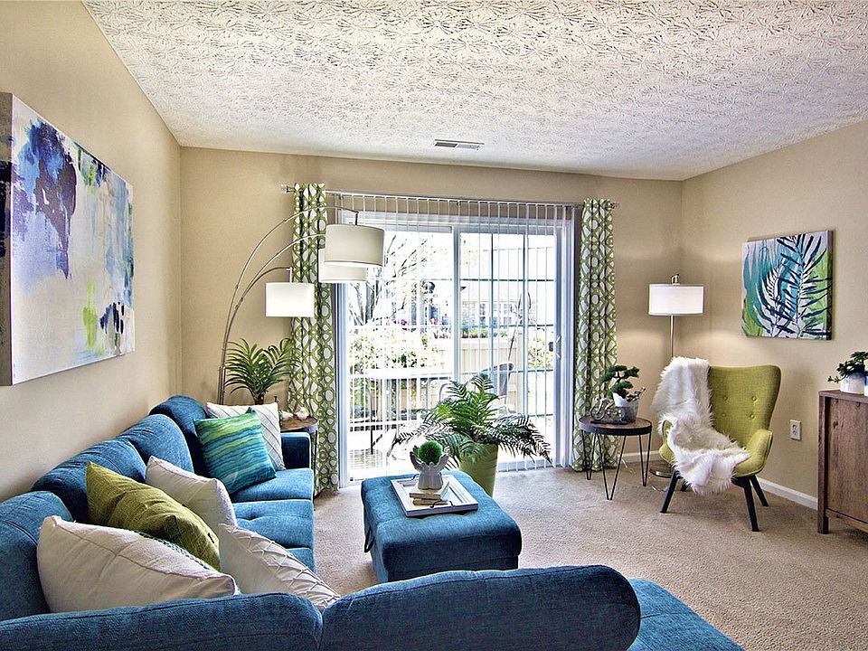 Cozy living room with natural light and seating