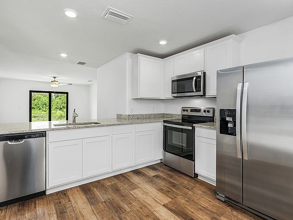 A beautiful kitchen with upgraded appliances