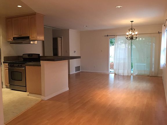 Kitchen / Dining Room ; Rear Slider ; Master Bedroom & Bath (rear-left)