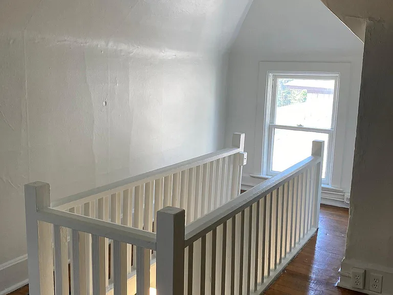 Staircase. Fresh paint throughout.
