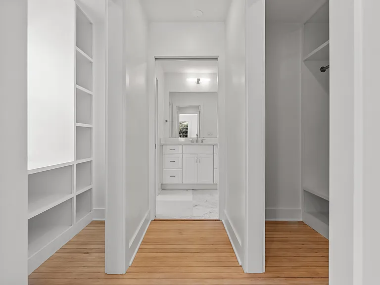 Primary His and Her Closets.