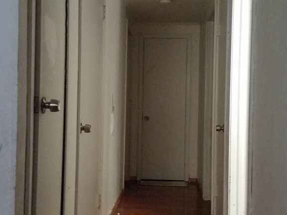 hallway with wood floors