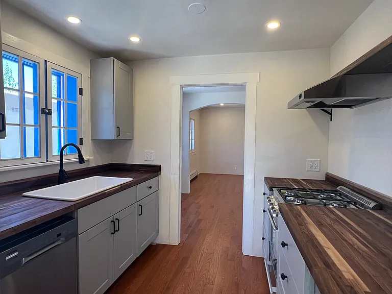 Kitchen includes brand new cabinets, countertops and appliances.