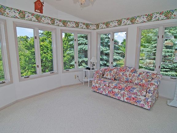 Serene Sunroom With Panoramic Views