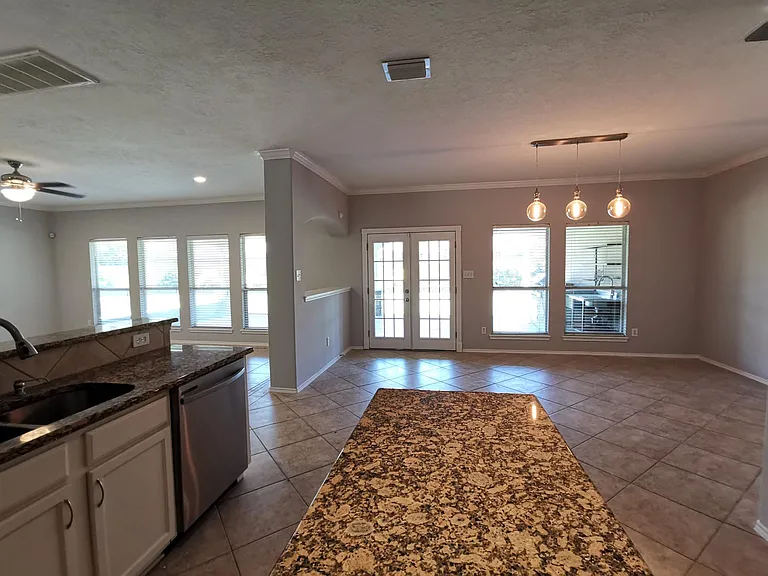 Dining room with a French door open to the patio