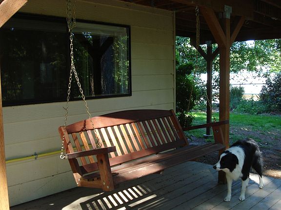 Porch shttp://images1.zillow.com/is/image/i0wing-lower deck facing forest view