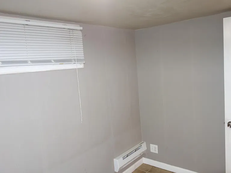 Bonus room has window looking out to the lawn.