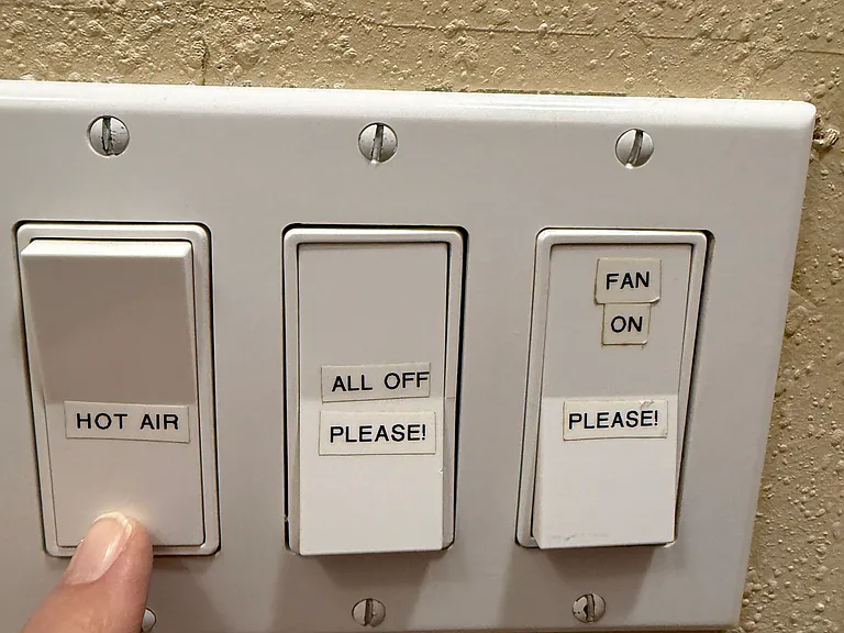 Hot air fan in bath.