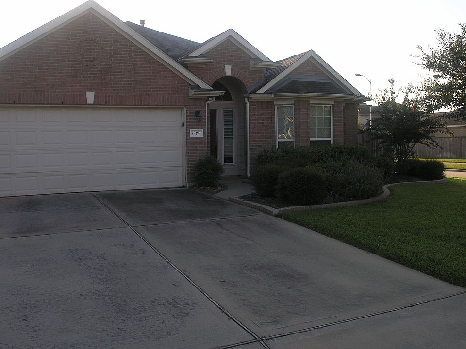 Welcome home to this nicely landscapped yard that you won't