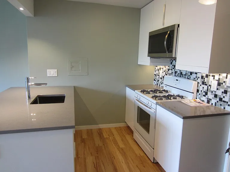 OPEN KITCHEN WITH UPDATED APPLIANCES
