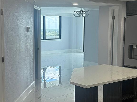 side of kitchen looking toward living room