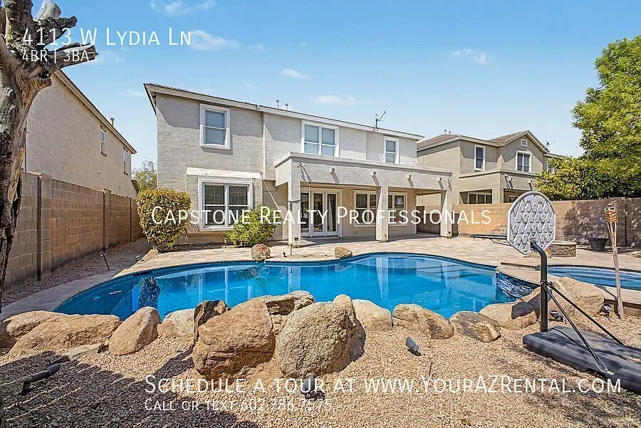 Stunning 4-Bedroom, 2.5-Bathroom Oasis with Pool and 3 Car Tandem Garage in Phoenix — Photo 2