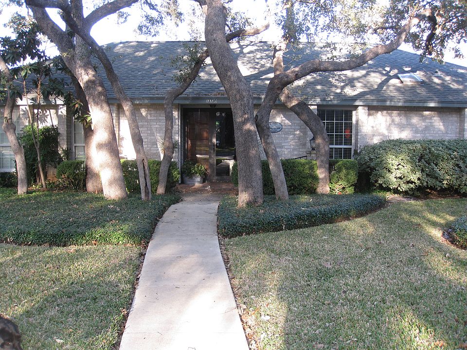 Brick house manicured yard