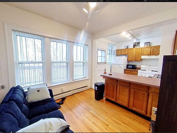 OFFICE/DINING/DEN OPEN TO KITCHEN ISLAND. VERY MODERN LAYOUT