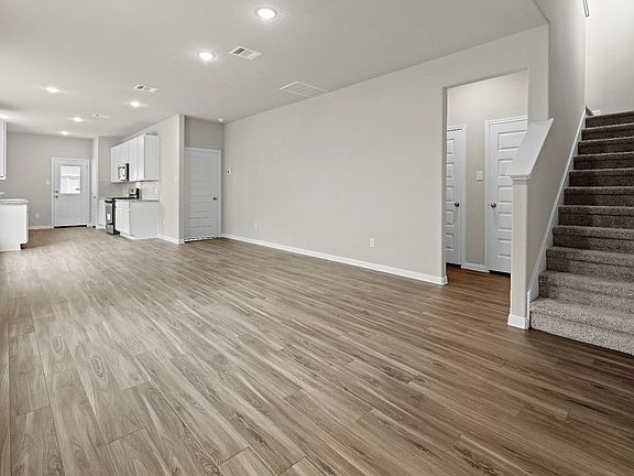 Family Room to Dining Area and Kitchen