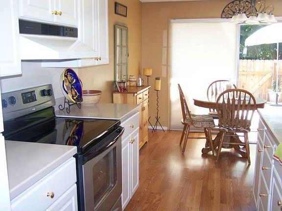 Light and bright describes this updated kitchen with a slider out to the private backyard area.