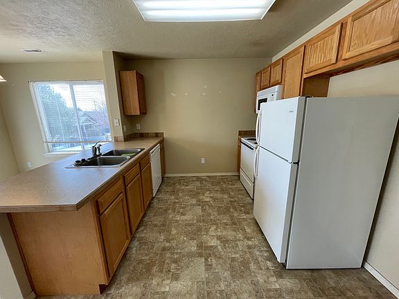 4th image of 6139 S Sea Breeze Way APT 202