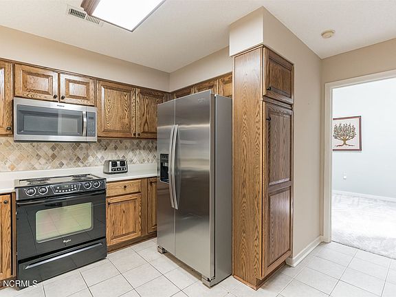 5th image of 6030 Inland Greens Dr
