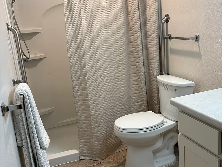 bathroom with walk in shower
