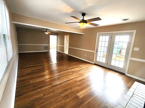 Spacious living room with patio access