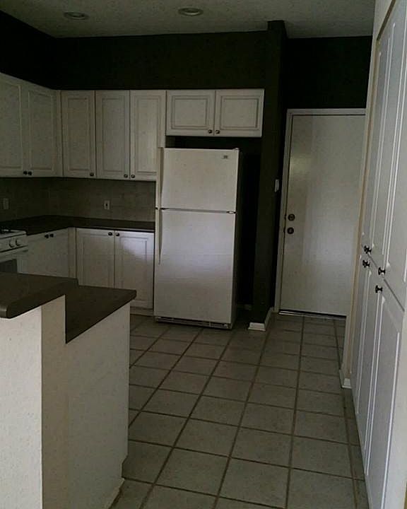 Large walk in kitchen with refrigerator
