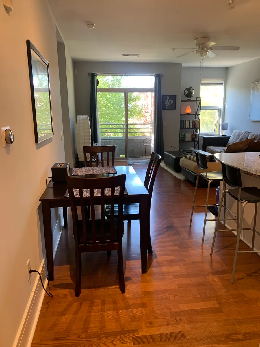 From the hallway looking into dining area, kitchen (on the right) and living area - 1600 Fulton Ave