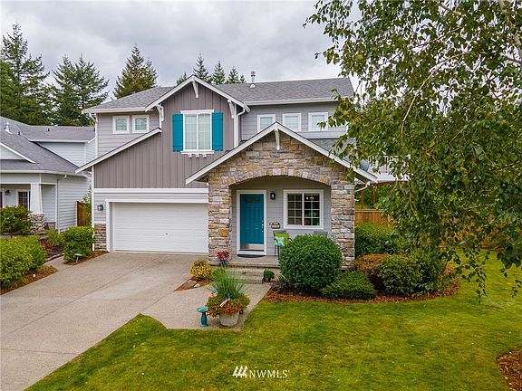 Ample windows to bring in the light and capitalize on the privacy afforded on the huge lot adjacent to massive open spaces. Ride, Run and walk the dogs right from your home. No need to get into a car. 