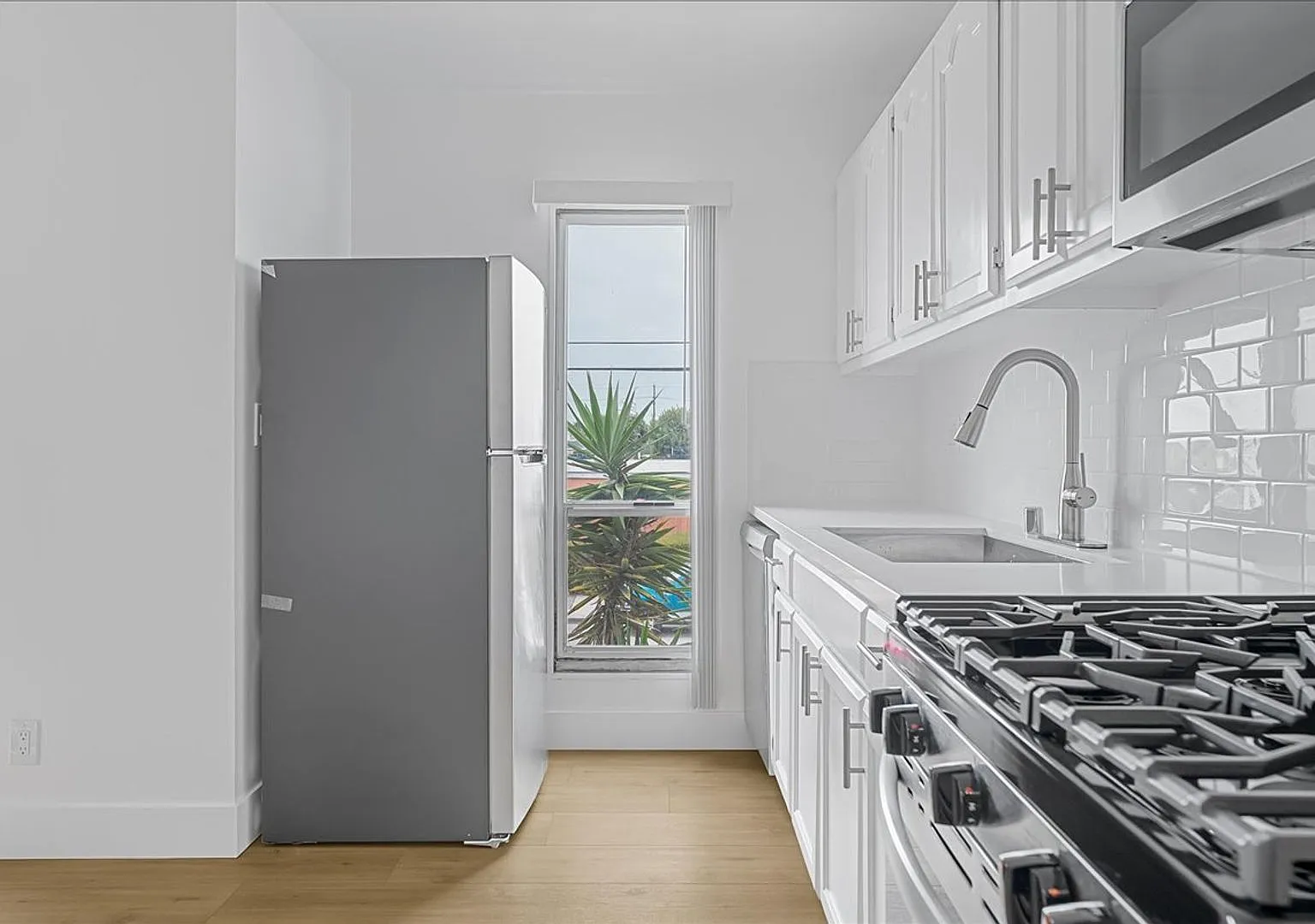 Beautiful Second Floor Apartment With Balcony! — Photo 3