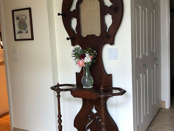 entry with view to laundry and downstairs bathroom