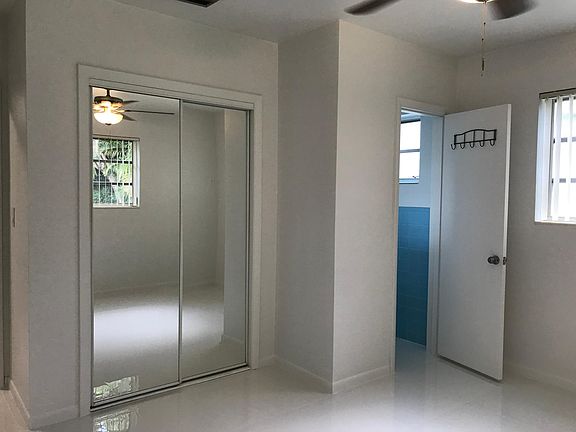 Another view of the master bedroom with half bath.