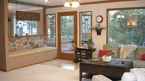 Living room with built in seating and storage
