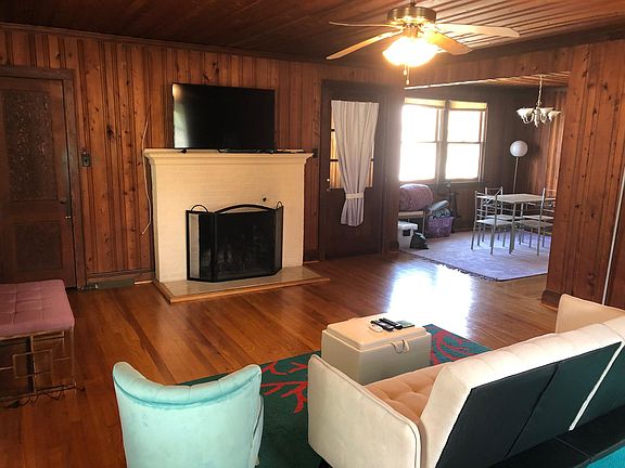 Living room view into dining room.