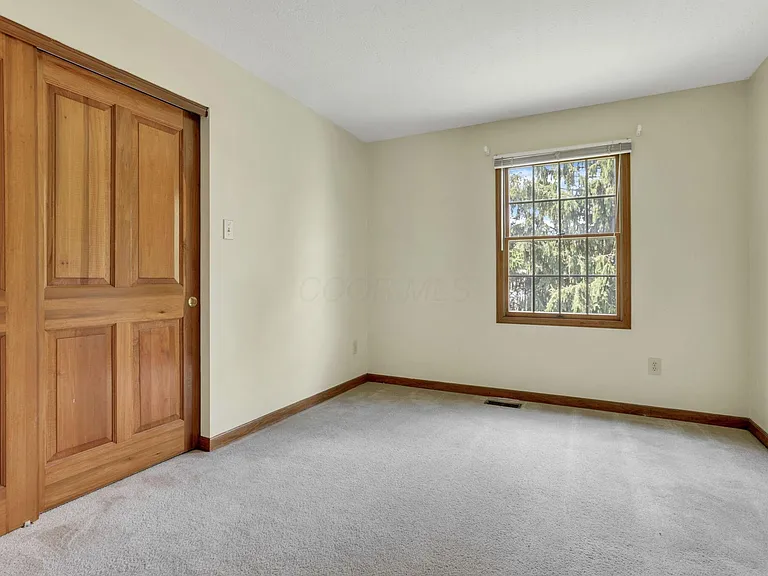 7641 Finbarr Ct — Photo 22
