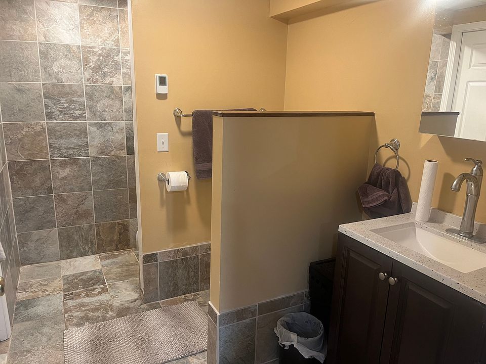 New tiled bathroom with walk-in shower