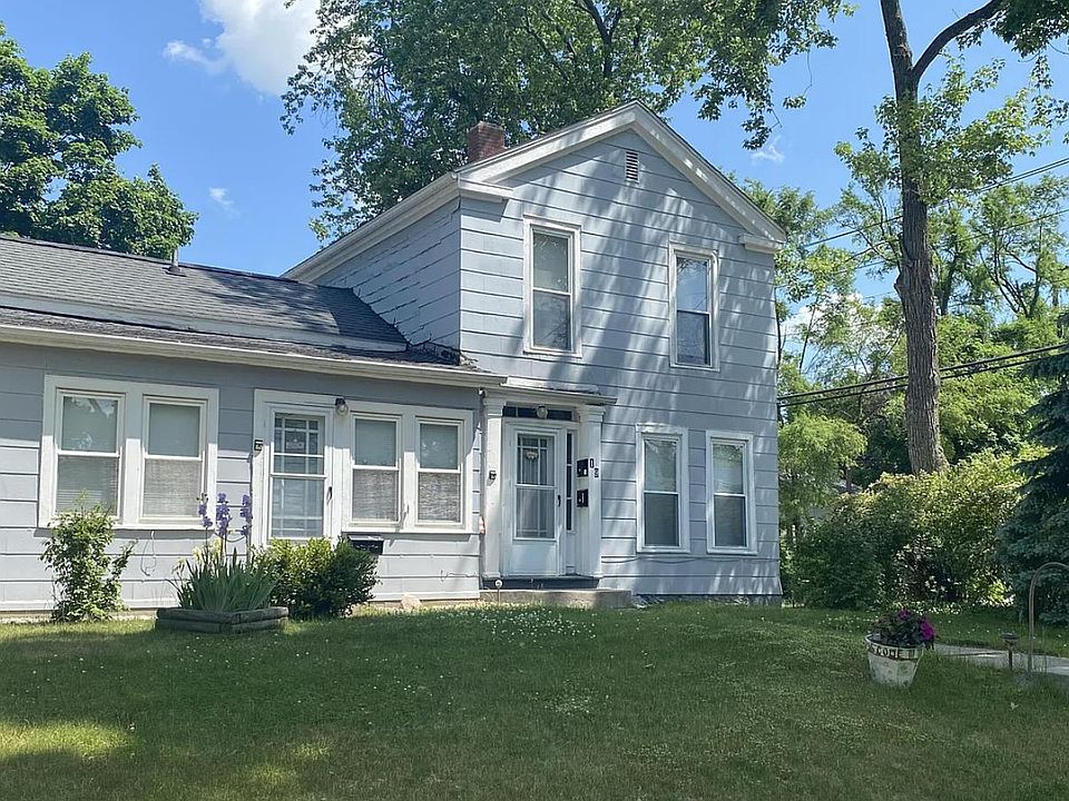 19 Mead St. Exterior. The left door is a direct entrance to this lower unit. There is also a rear door as well.