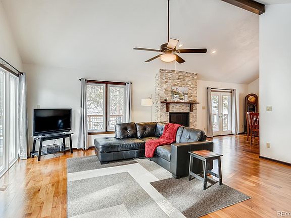 Living Room with view of Dining access and additional French doors to deck