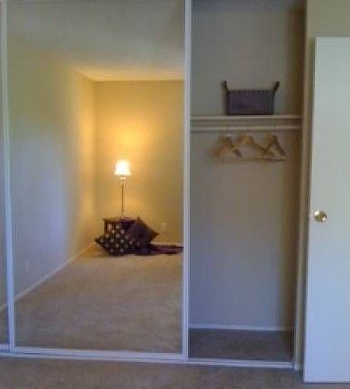 Mirrored closet doors in