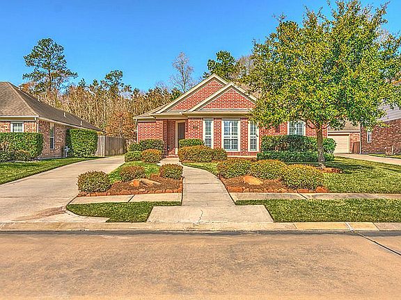 Gorgeous Landscaping with walkway and sidewalk.