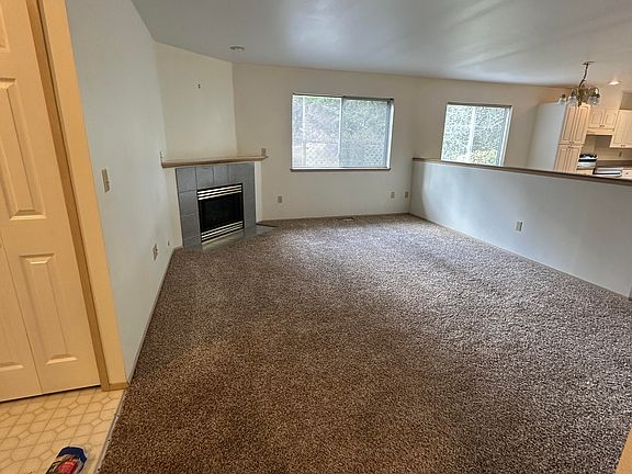 family room and 1/2 looking into kitchen