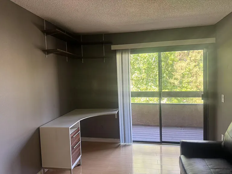 bedroom, lower floor, and lower floor balcony