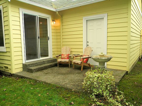 2nd image of 9767 Windcove Ln NW
