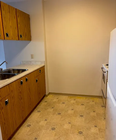 view of the kitchen to the right when we walk in