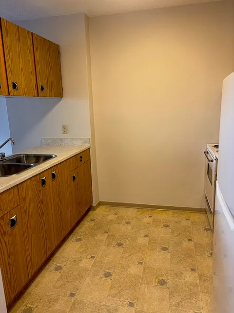 view of the kitchen to the right when we walk in