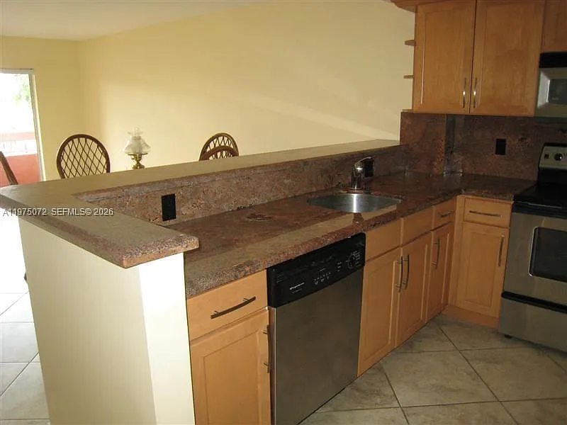 Building Photo - 7722 Camino Real #E-301