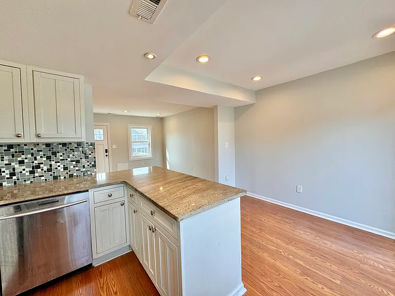 Updated Kitchen with Breakfast Bar and Stainless Steel Appliances