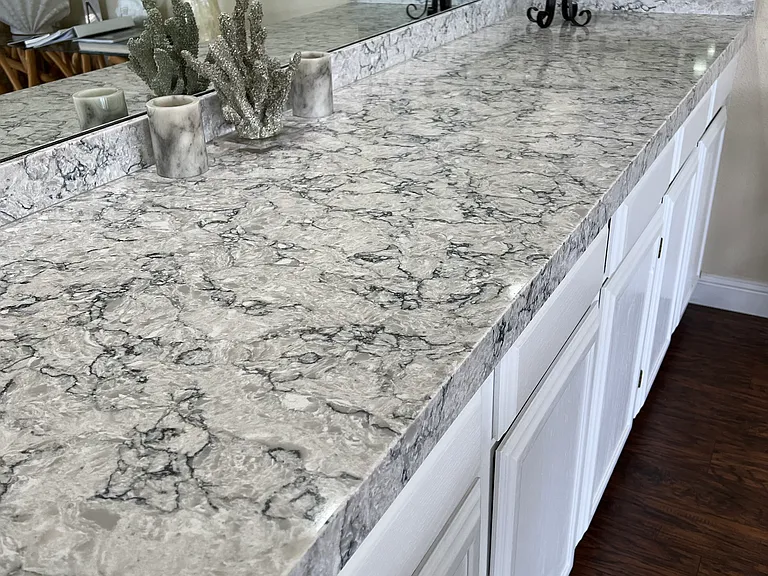 New Quartz bar counter or buffet counter with plenty of storage and mirrored all around to capture all the beautiful views and light.