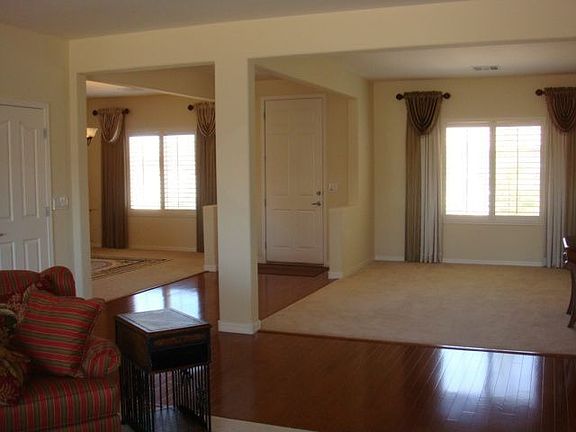  Gorgeous Hardwood floors greet you at the open foyer, flanked by LR and DR