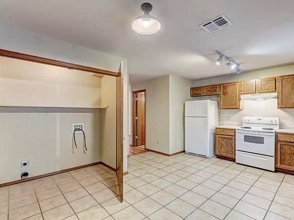 kitchen with view of laundry room