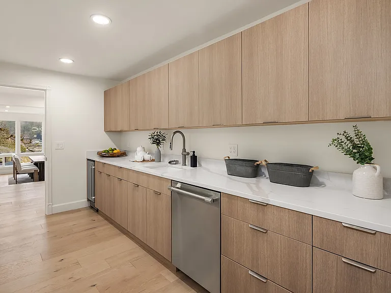 A secondary kitchen for a wetbar, or use for the nanny/secondary entrance office
